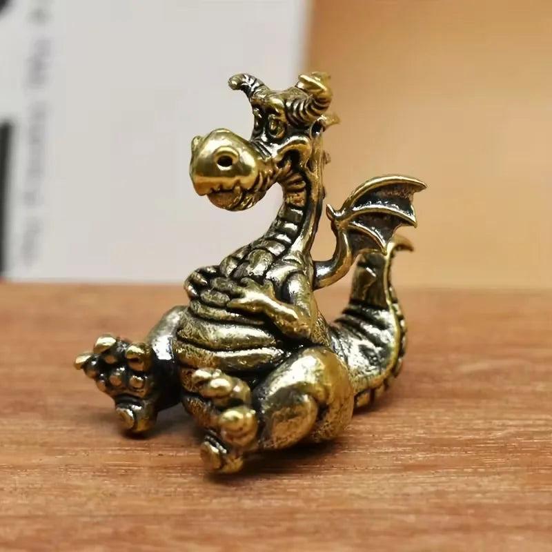 Tiny Seated Dragon Metal Figurine