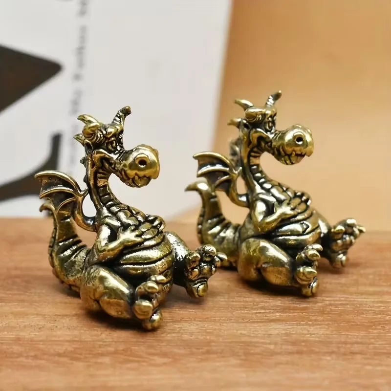 Tiny Seated Dragon Metal Figurine