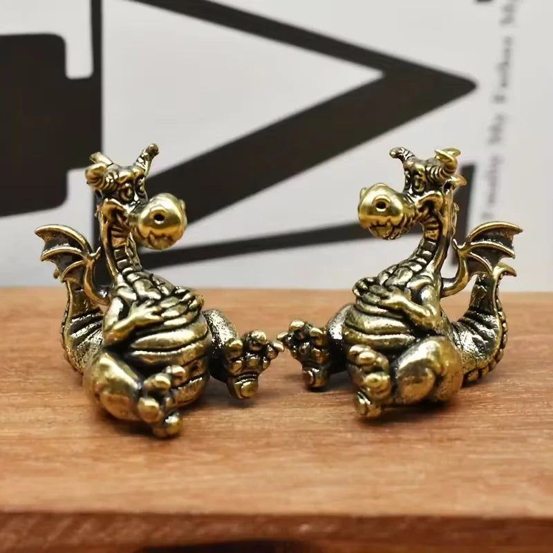 Tiny Seated Dragon Metal Figurine