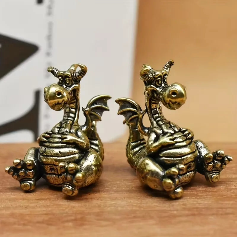 Tiny Seated Dragon Metal Figurine